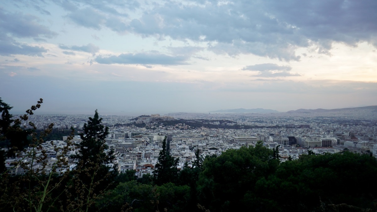 Αθήνα: Ένα βροχερό καλοκαιρινό απόγευμα μέσα από φωτογραφικά καρέ